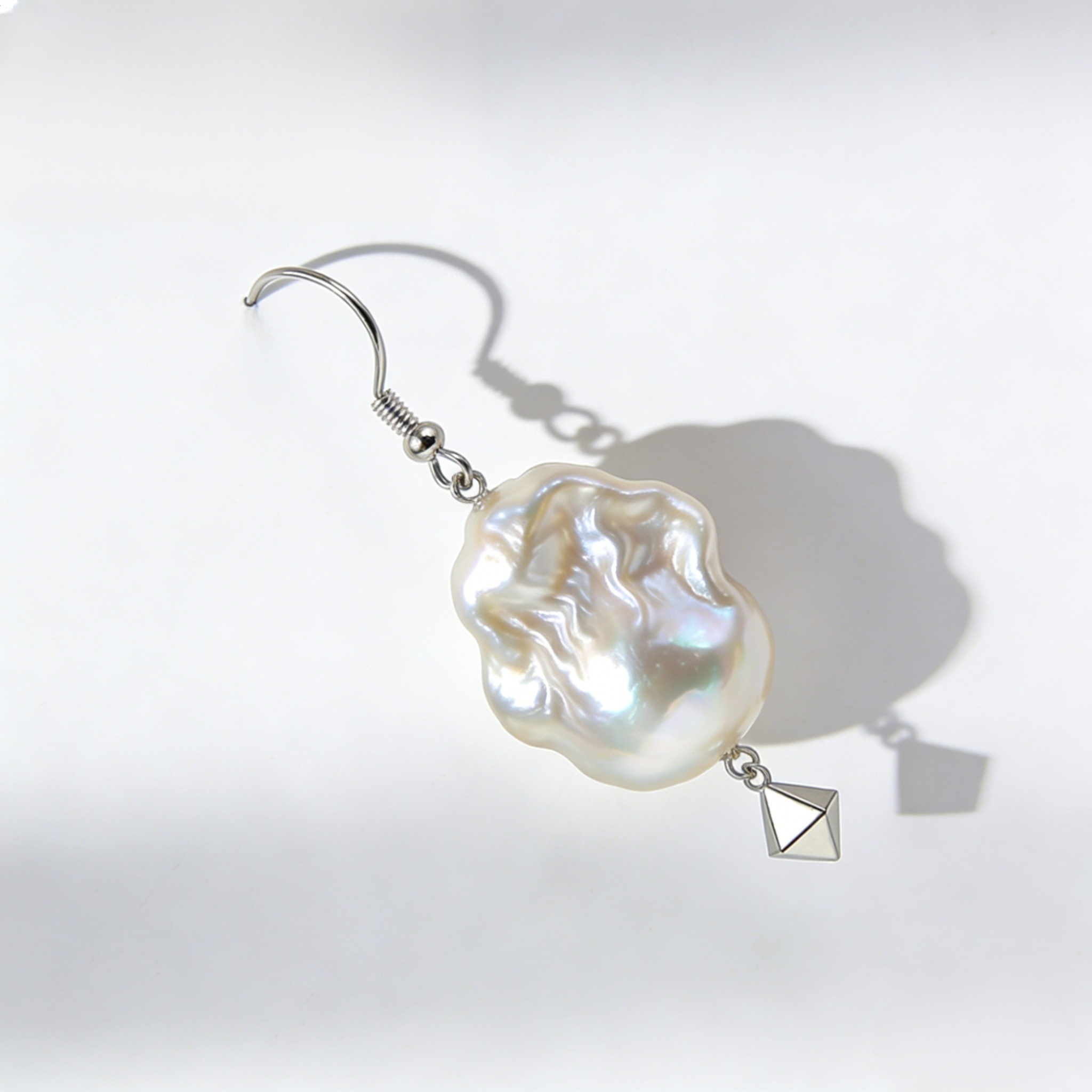 Handcrafted vintage pearl earrings with irregular shapes