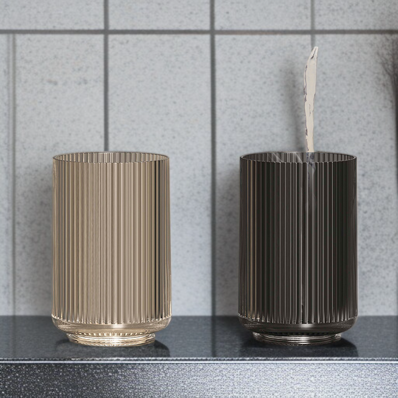 Electric toothbrush and cup organizer mounted on bathroom wall