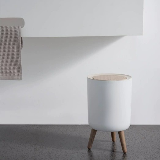 Tall wooden trash cans that eliminate the need to bend over