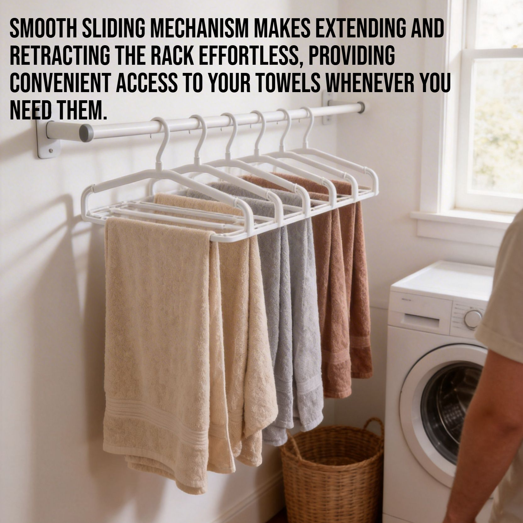 Retractable bath towel rack mounted on bathroom wall