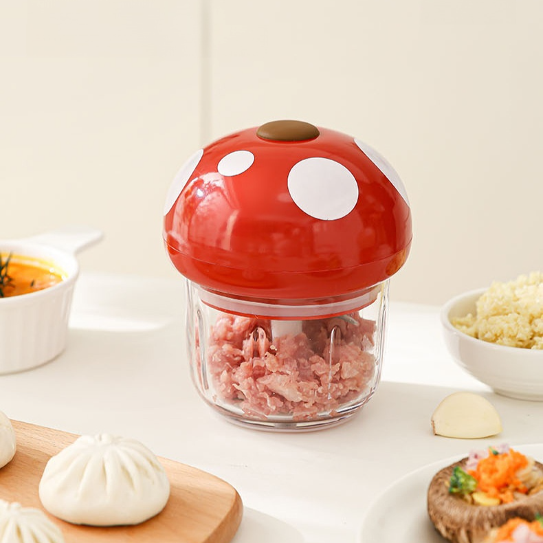 Portable electric garlic press