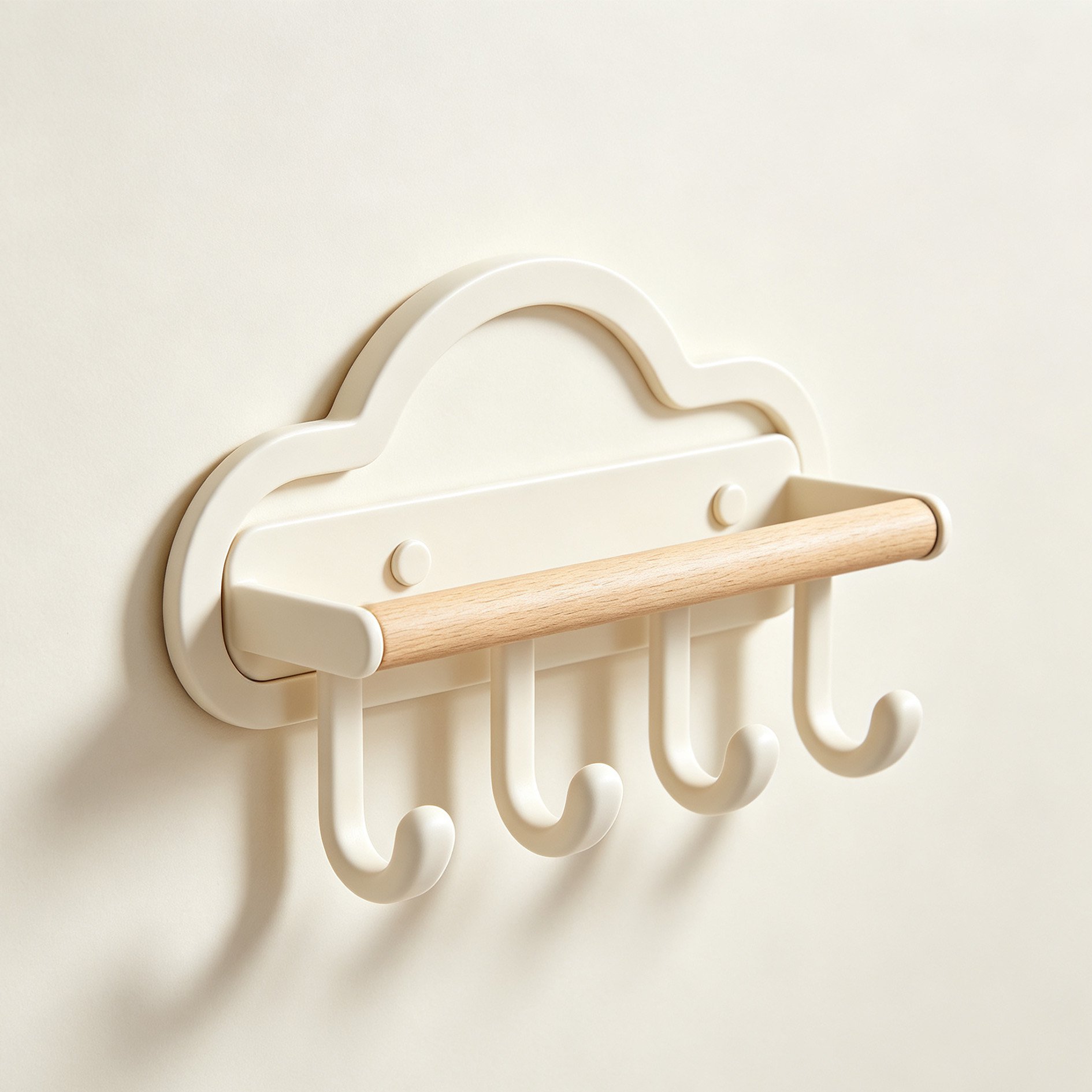 Cloud-shaped wooden hooks on a nursery wall