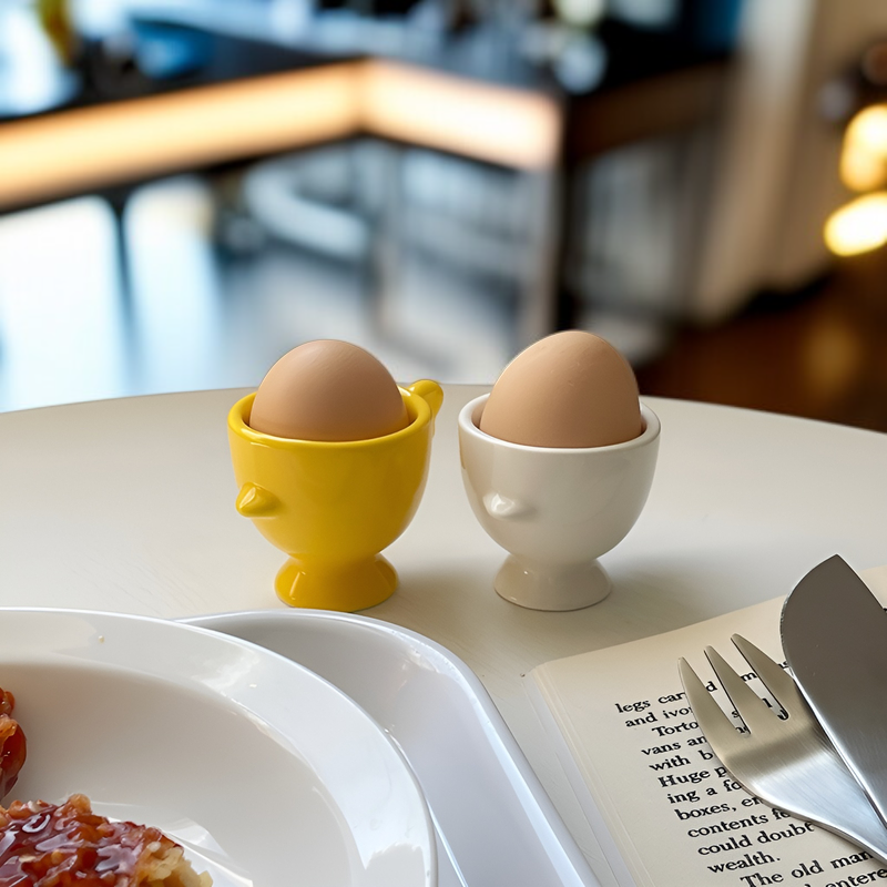 Fun Egg Cup holding a boiled egg on a breakfast table