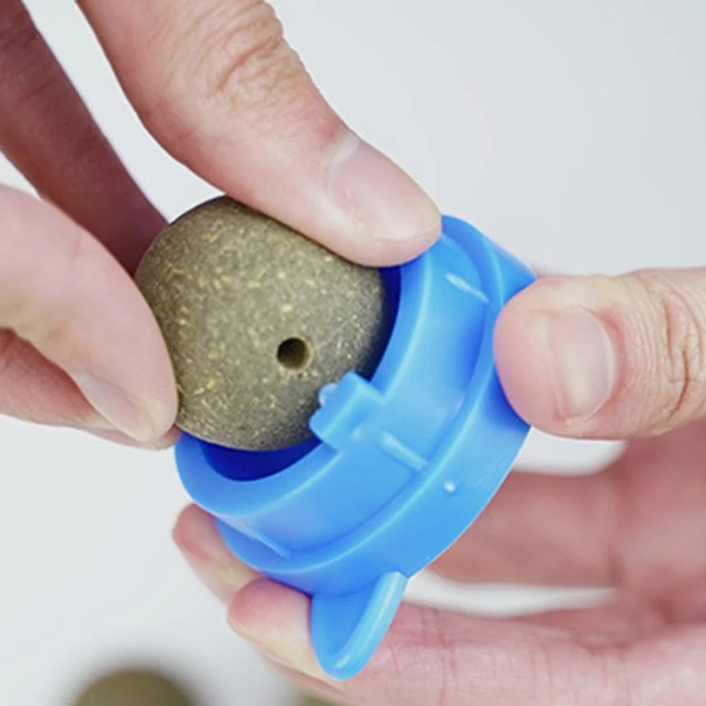 Mintfarbener, drehbarer Katzenball