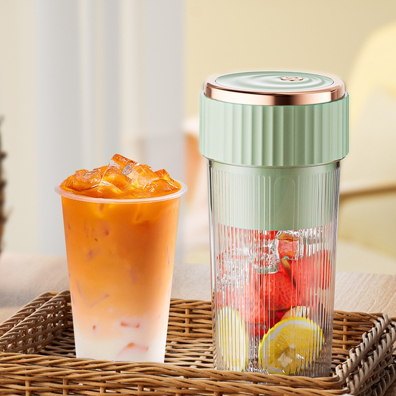 Vaso exprimidor portátil de frutas