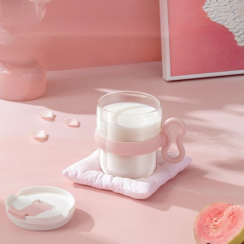Clear glass cup with handle and lid