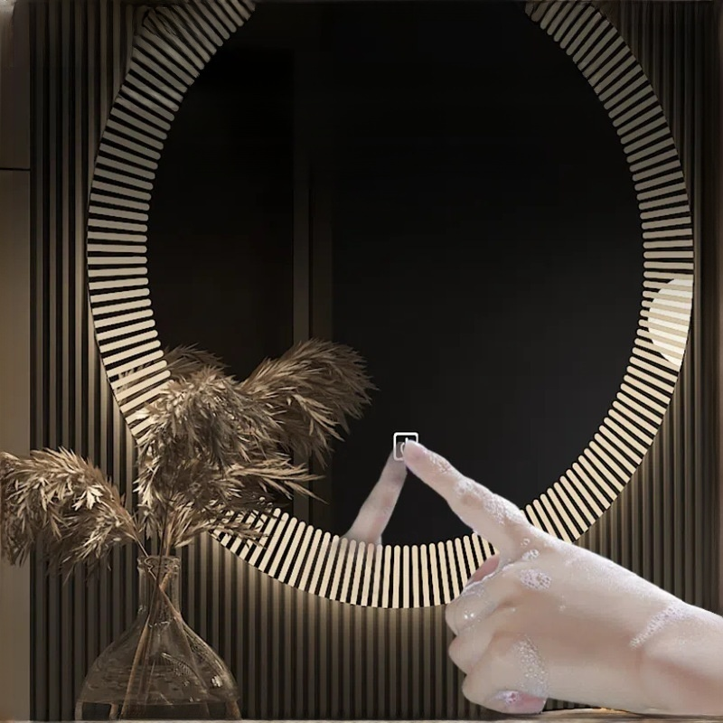 Wall mounted smart mirror with light hanging on the wall