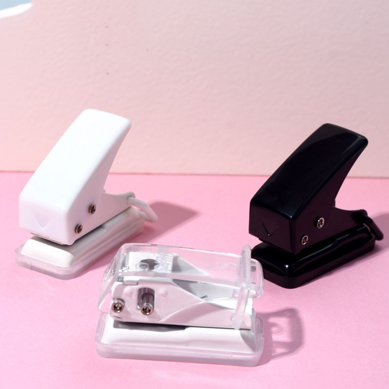 Small manual hole punch