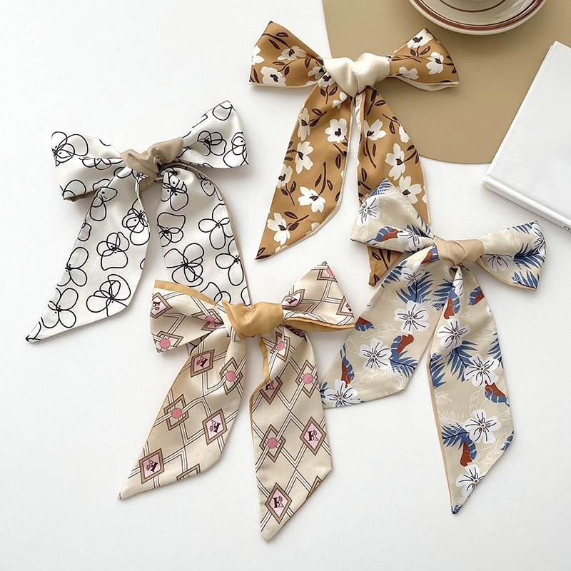 輝くヘッドバンドリボン