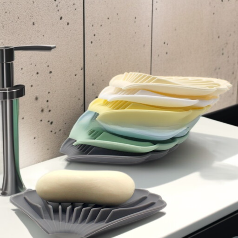 Jabonera de goma blanda con forma de concha y drenaje