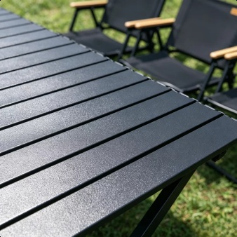 Camping table and chairs used during a family picnic
