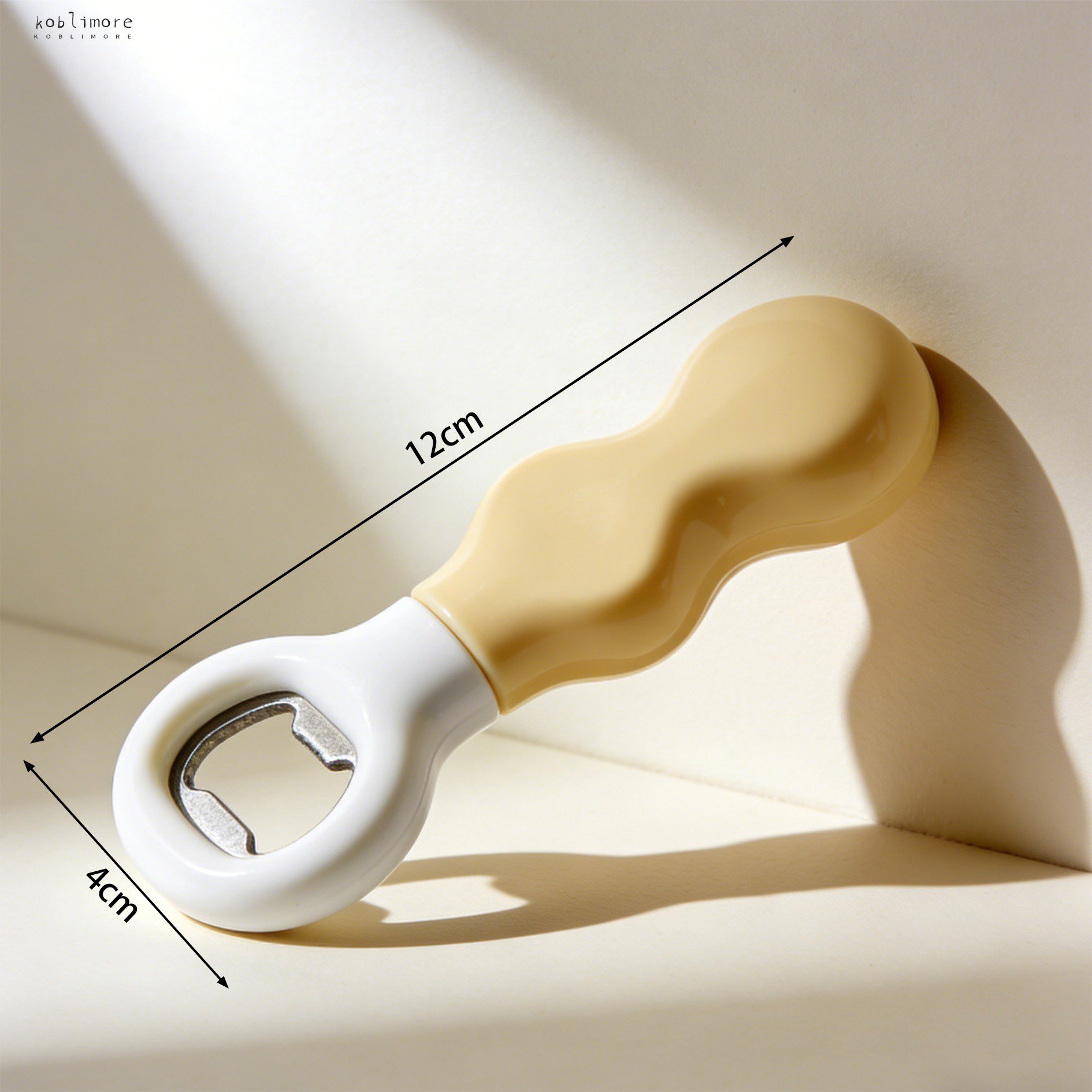 Close-up of magnetic bottle opener catching bottle caps