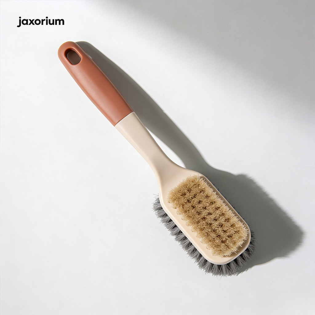 Household brushes with ergonomic handles