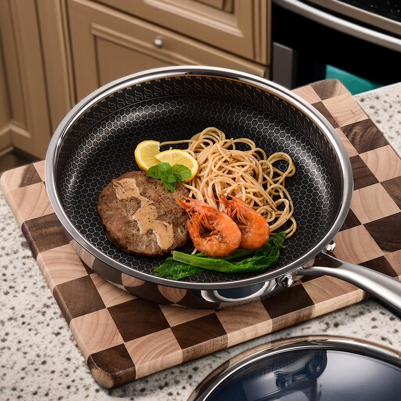 Non-stick honeycomb surface frying pan with lid