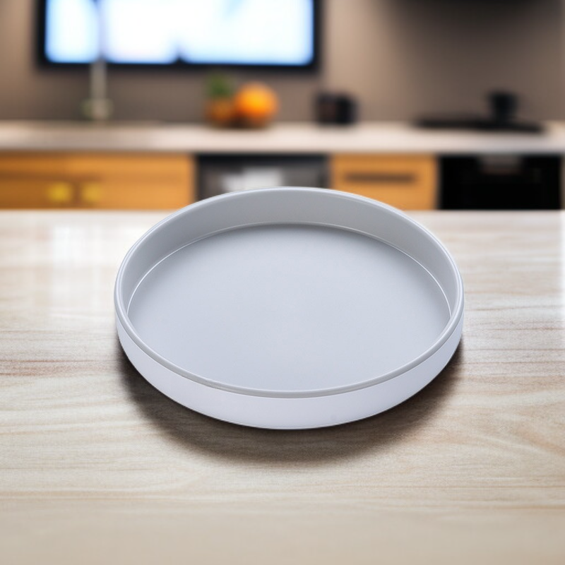 رف منظم دوار للتوابل والفواكه على الطاولة