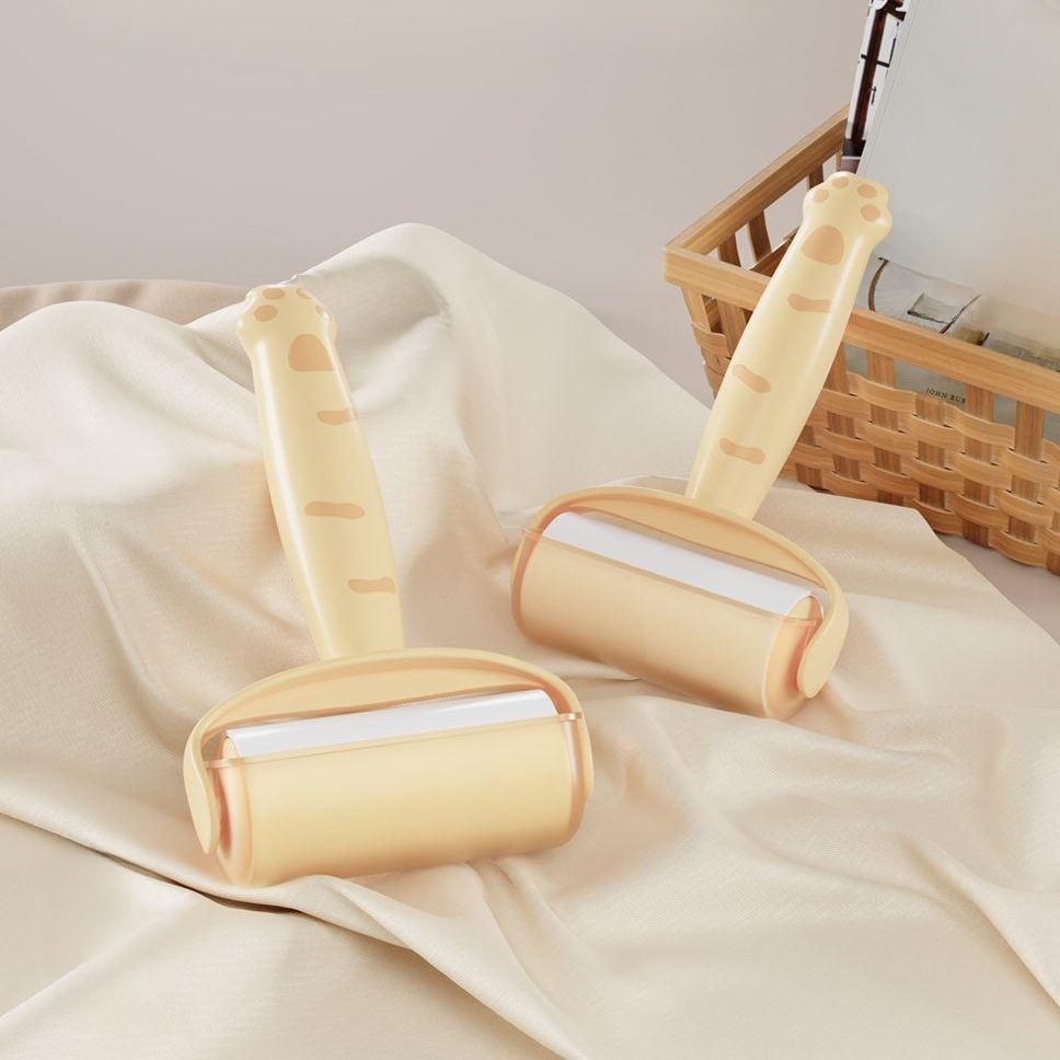 เครื่องม้วนกำจัดขนบนเสื้อผ้าแบบพกพา