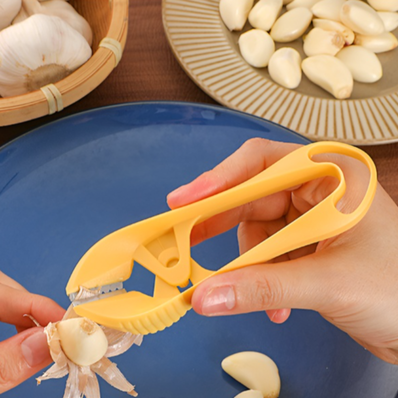 Stainless steel garlic peeler