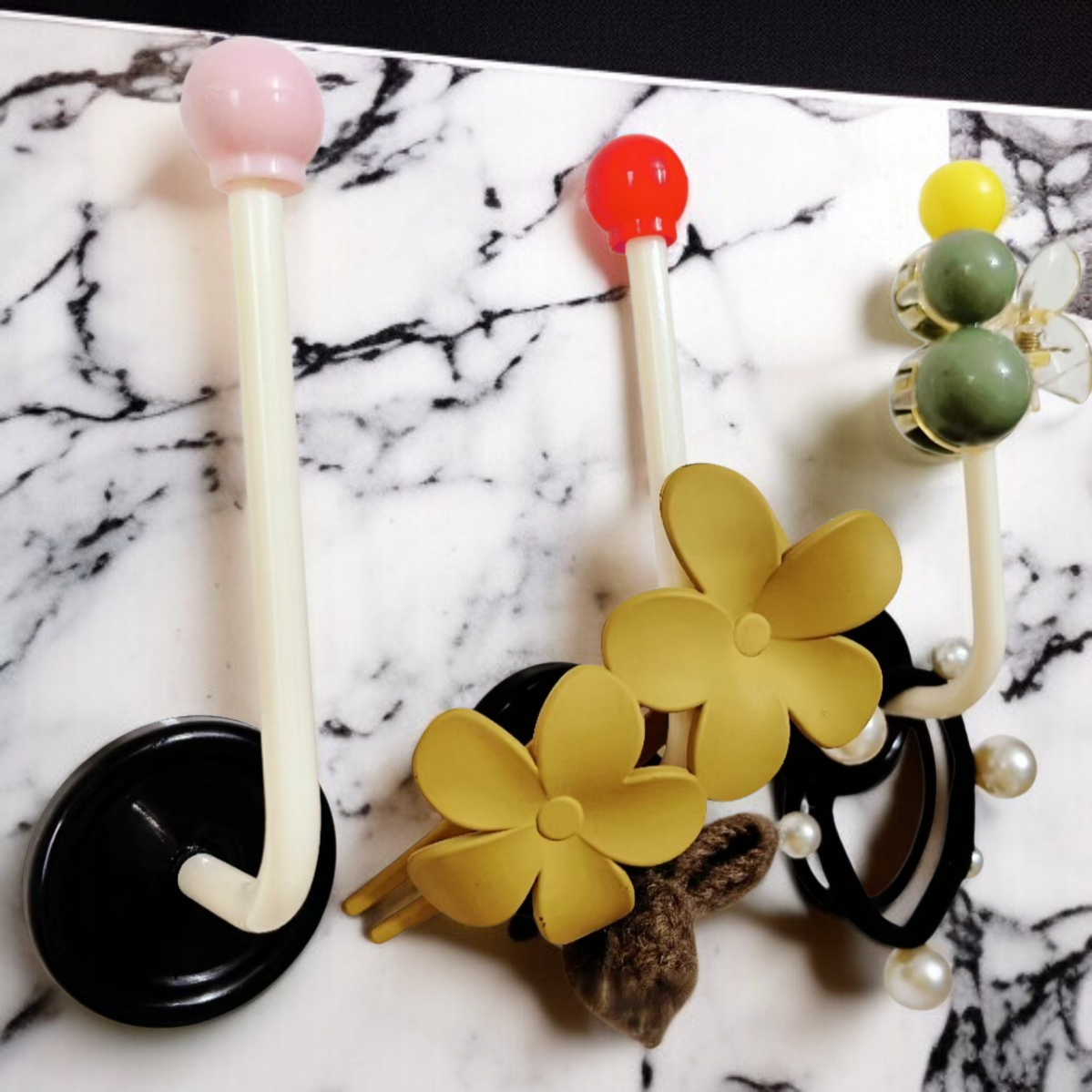 Bathroom wall mounted hair ring and headband storage rack