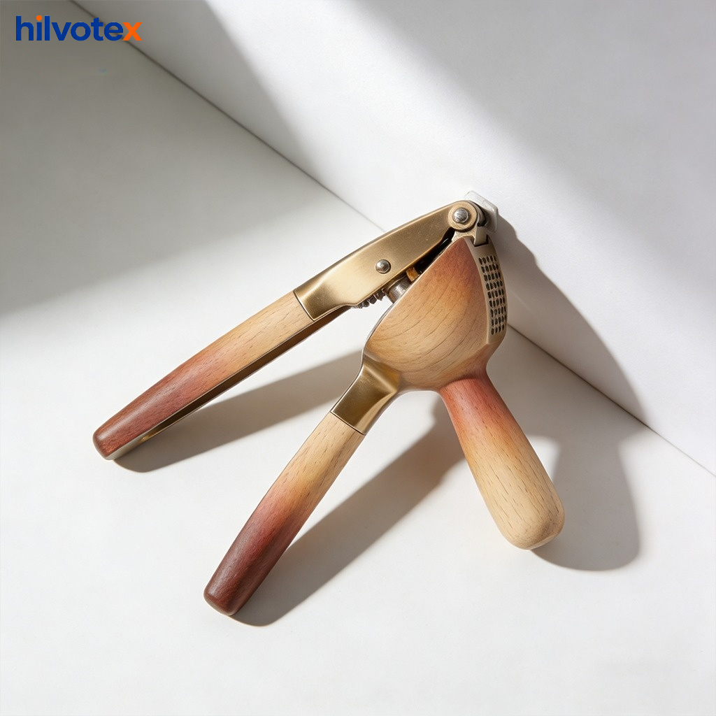 Wooden manual garlic press