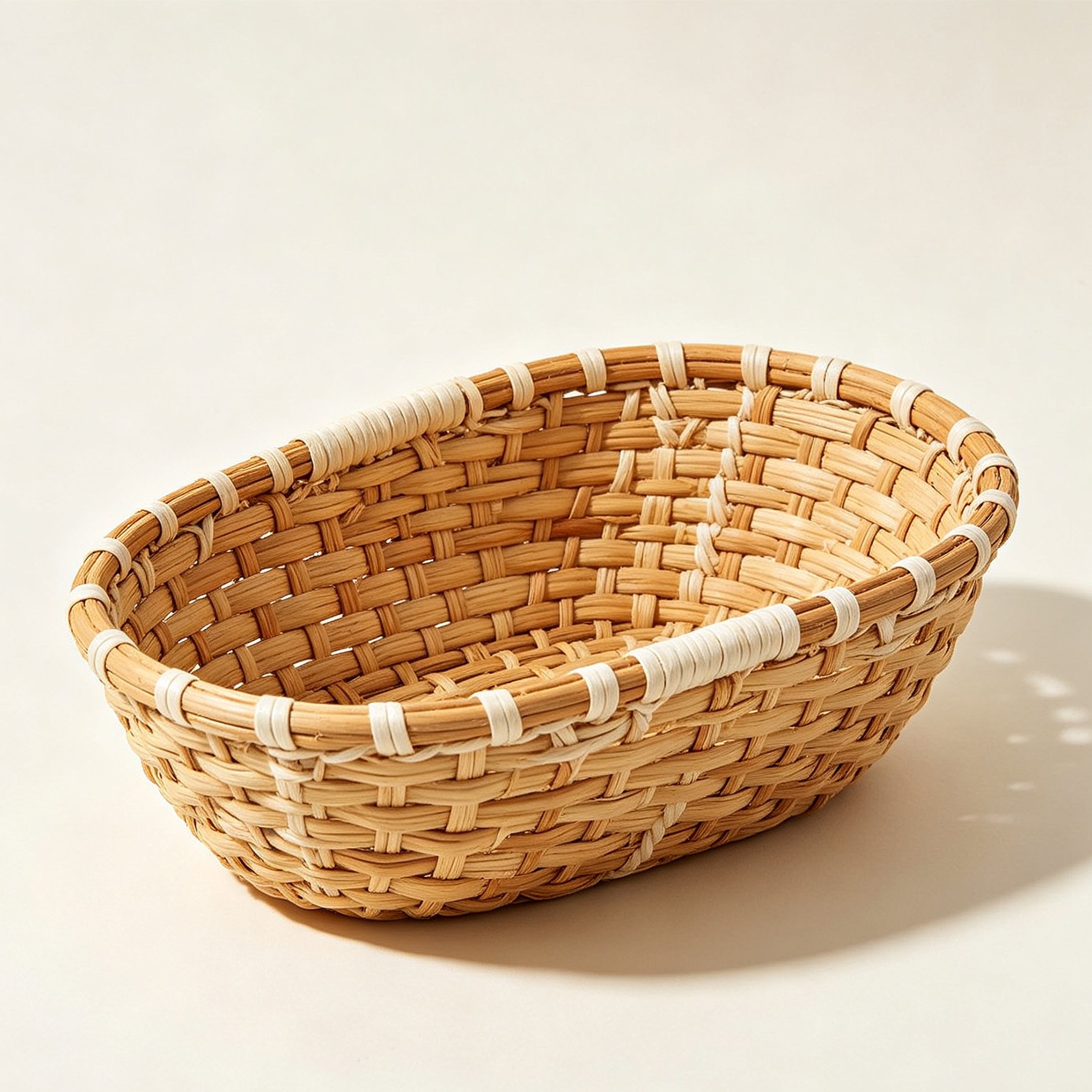 Oval woven storage basket made of raw wood