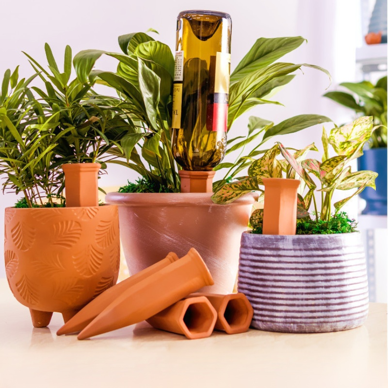 セラミック怠惰な自動花散水装置赤い陶器透水器 4 パックドリッパー庭点滴灌漑装置