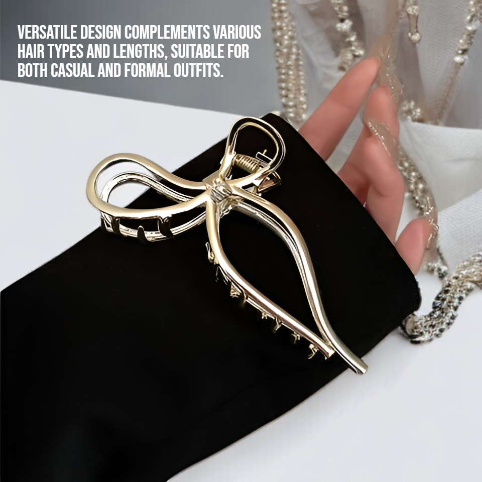 Close-up of bow metal hair clip in brunette hair