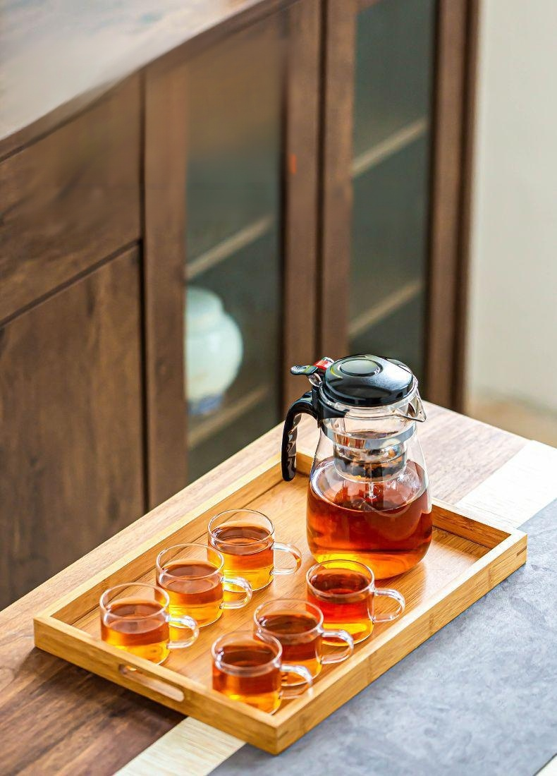 Hitzebeständige Teekanne aus dickem Glas mit Ein-Knopf-Filter