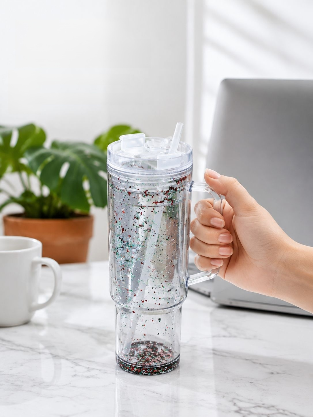 Side view of 40oz straw cup highlighting ergonomic build