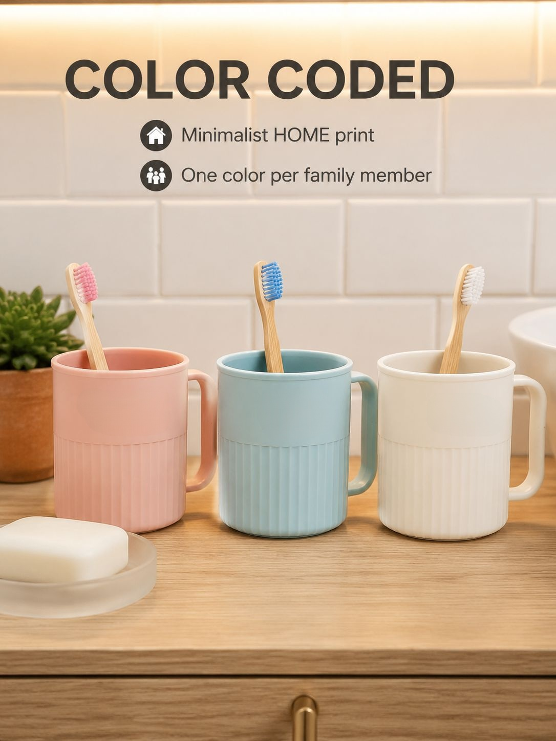 Toothbrush cup styled beside a bathroom sink