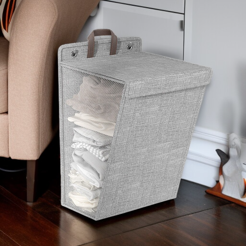 Cesta decorativa para organizar ropa en dormitorio