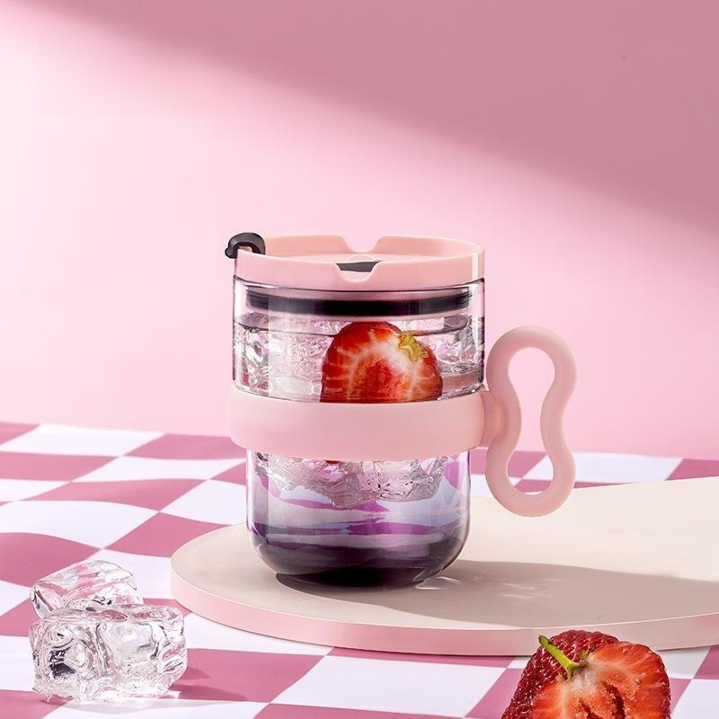 Clear glass cup with handle and lid