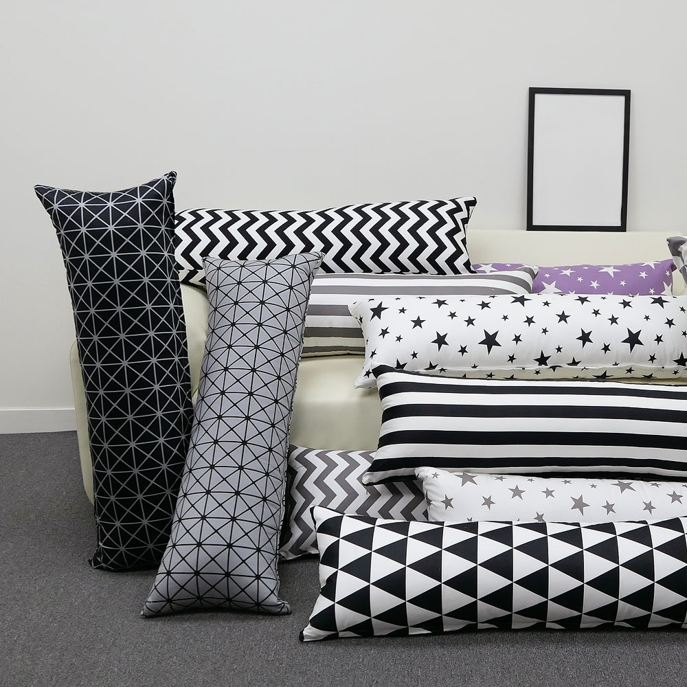 Geometric black and white cushion