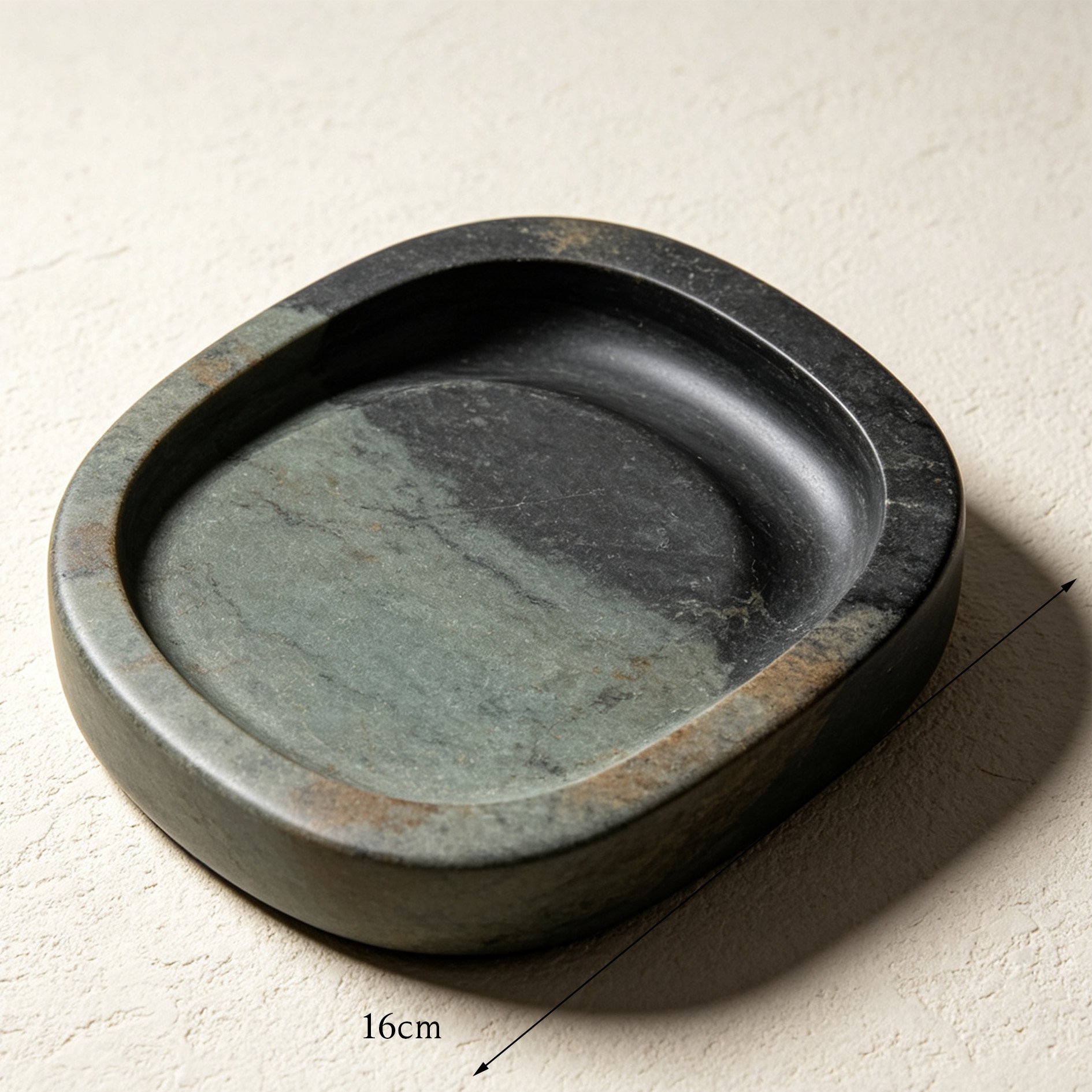Set of three oval stone inkstones for calligraphy