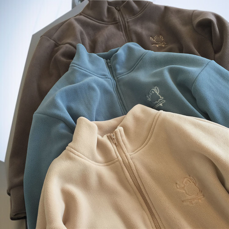 Elegant winter outfit featuring lamb wool coat