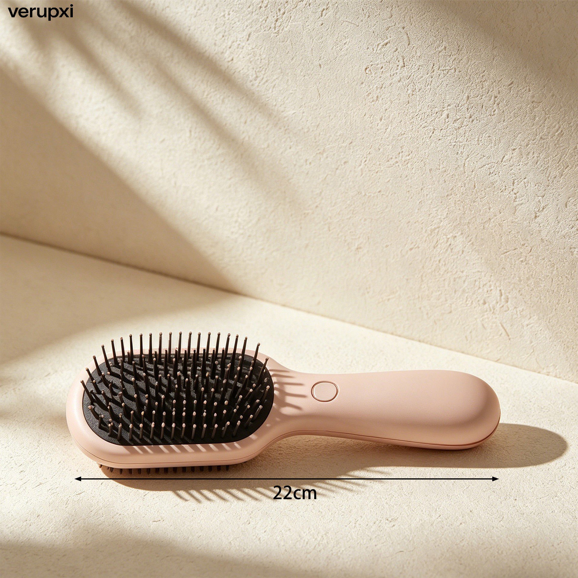 Hand holding ergonomic massage comb