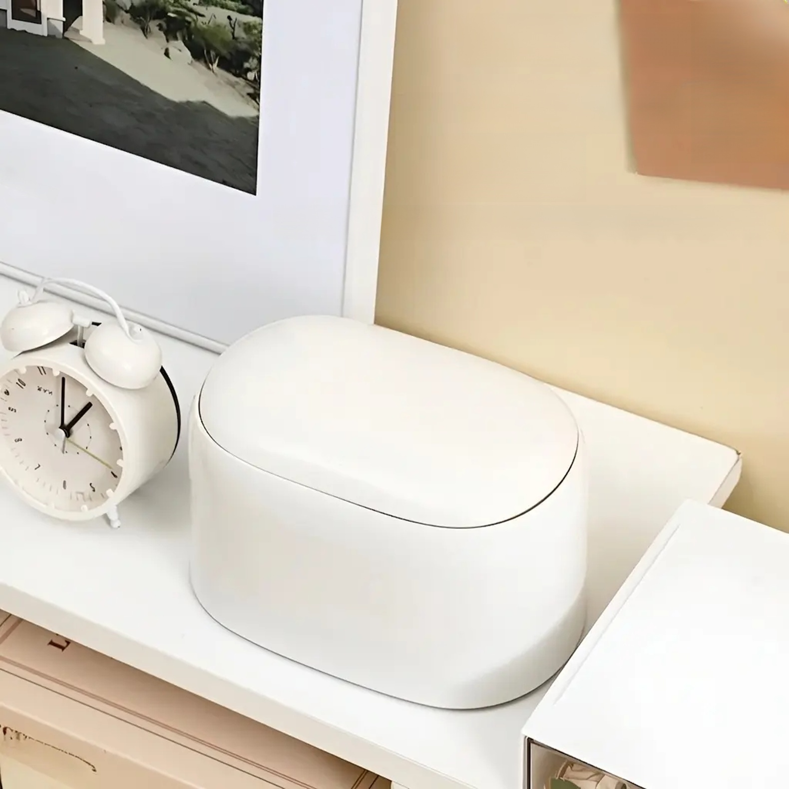 Press to open the countertop storage box.