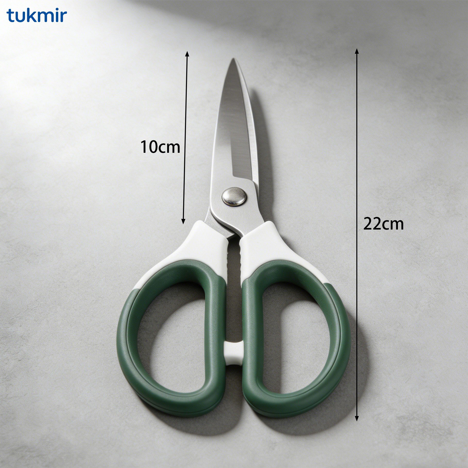 Scissors cutting various materials including paper, plastic, and food
