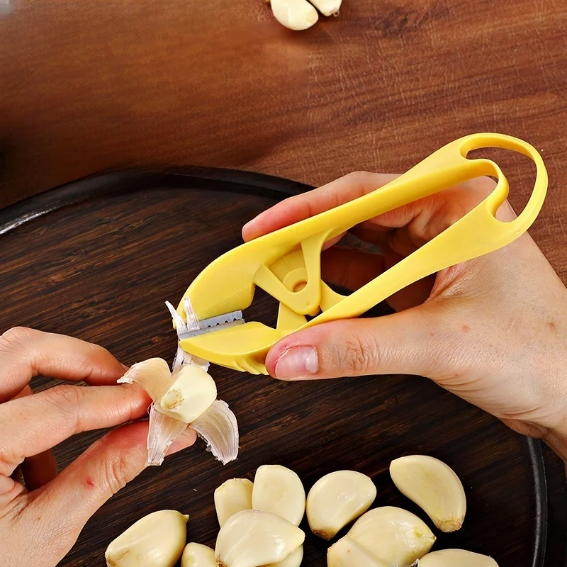 Stainless steel garlic peeler
