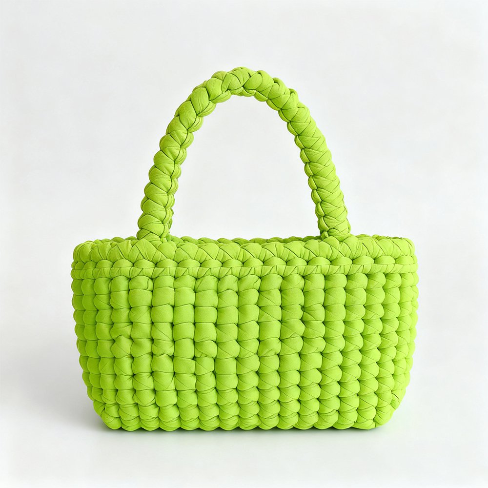 Handgefertigte grüne Flechttasche