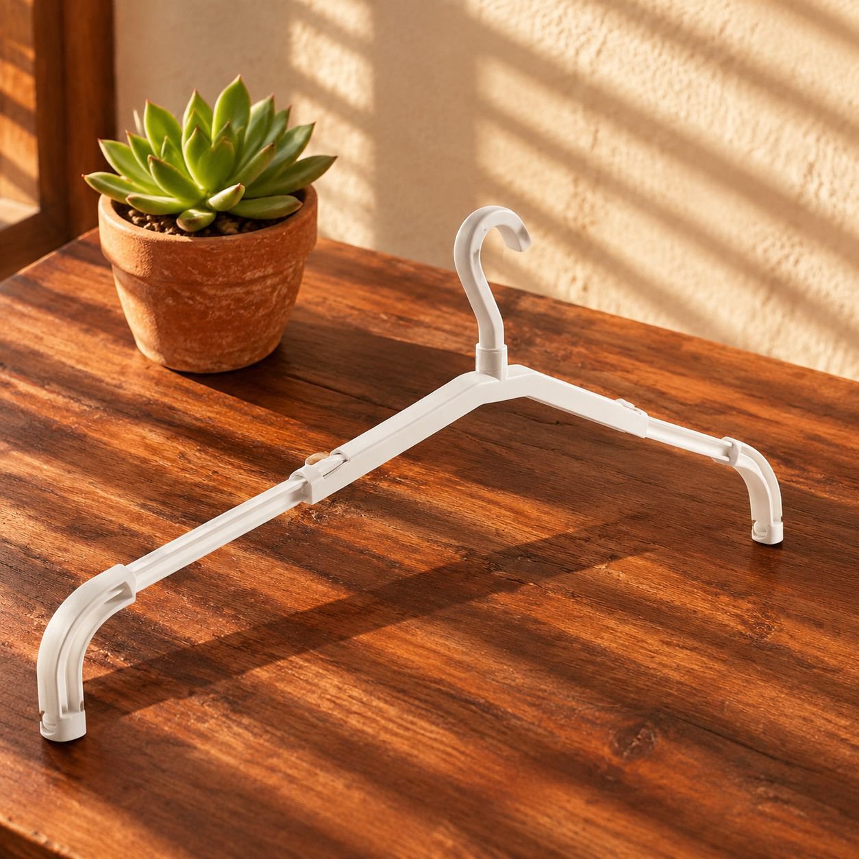 Perchero giratorio y extensible