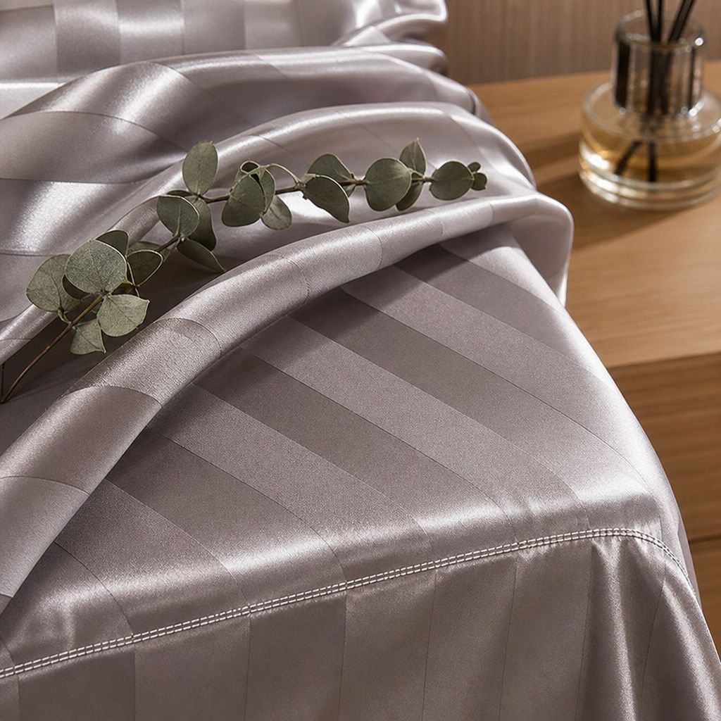 High-quality silk satin bedding in modern bedroom