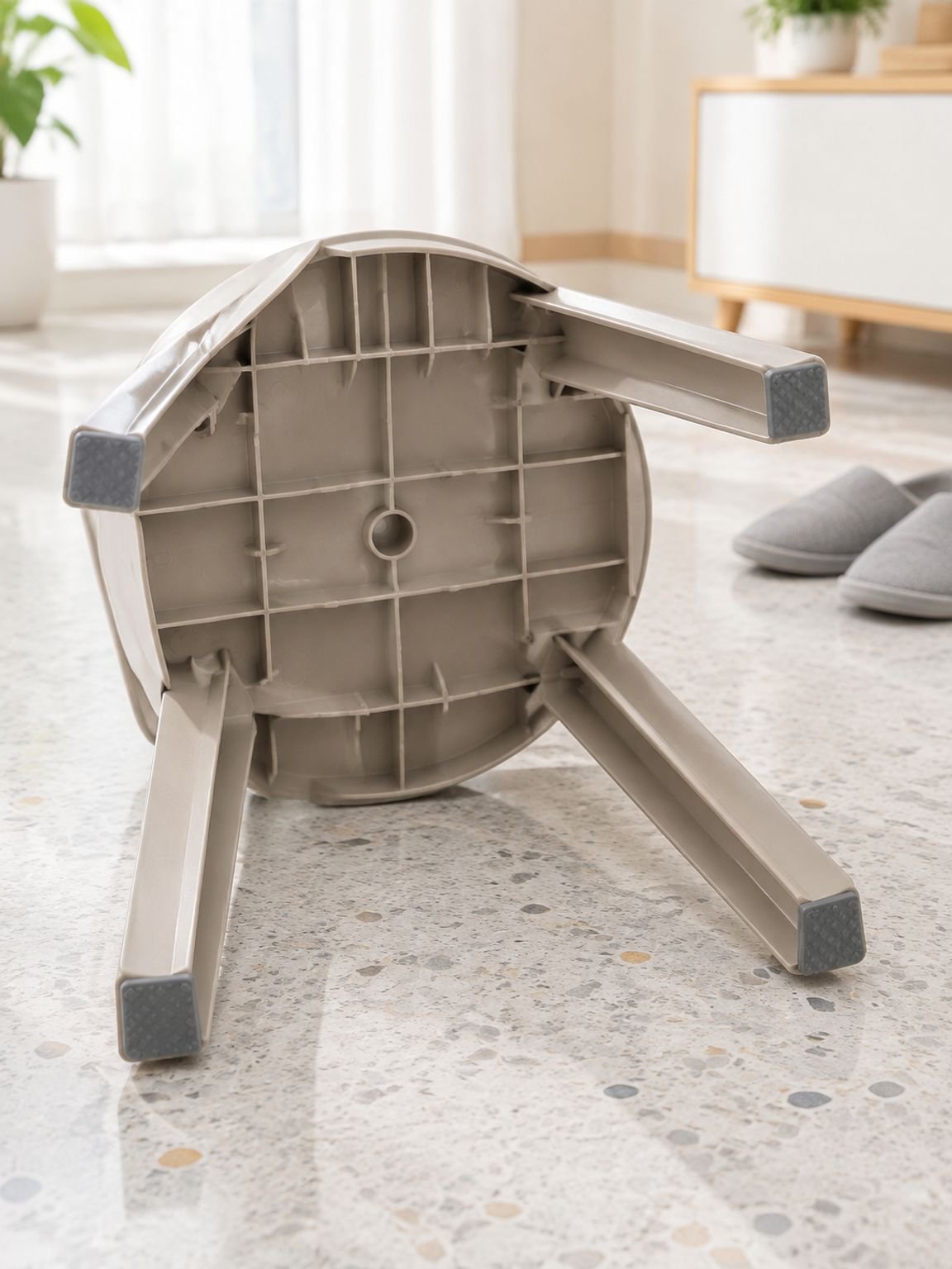 Close-up of the thick seat on a durable plastic stool