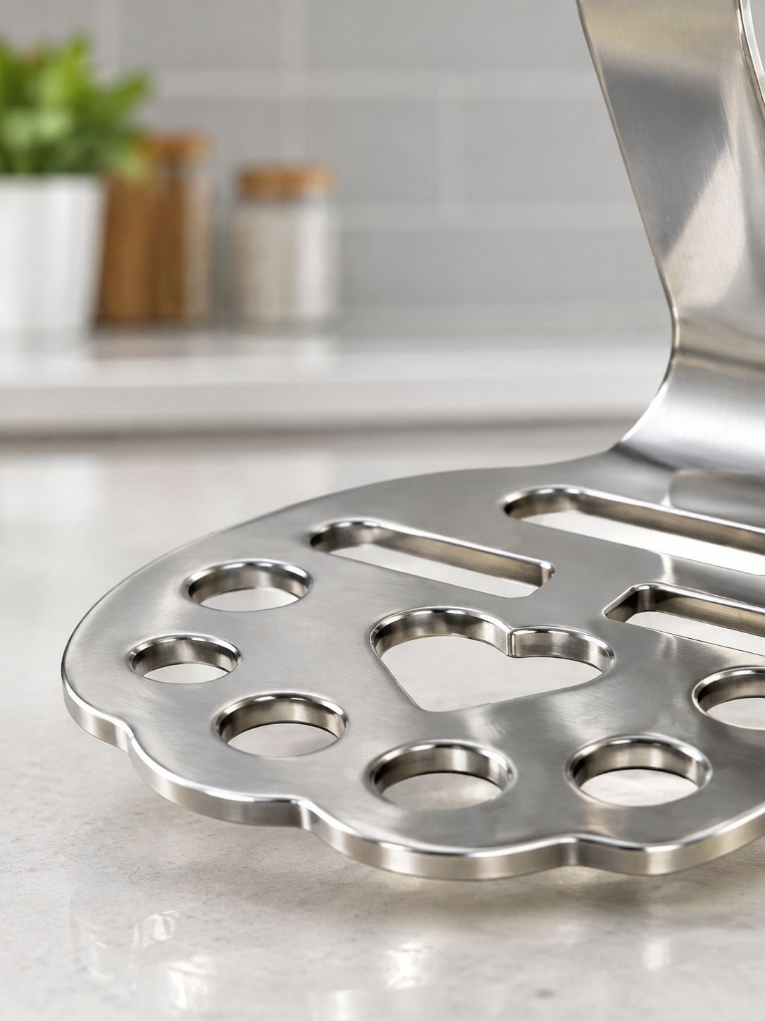 Utensilio resistente para hacer puré de papa