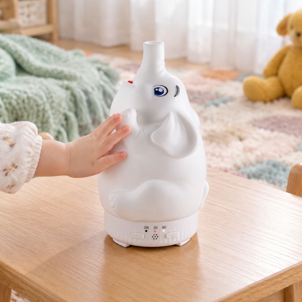 Colorful Light Rotating Elephant Aroma Diffuser on desk