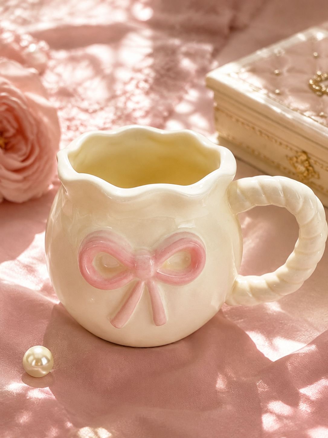 Close-up of cute bow detail on coffee mug