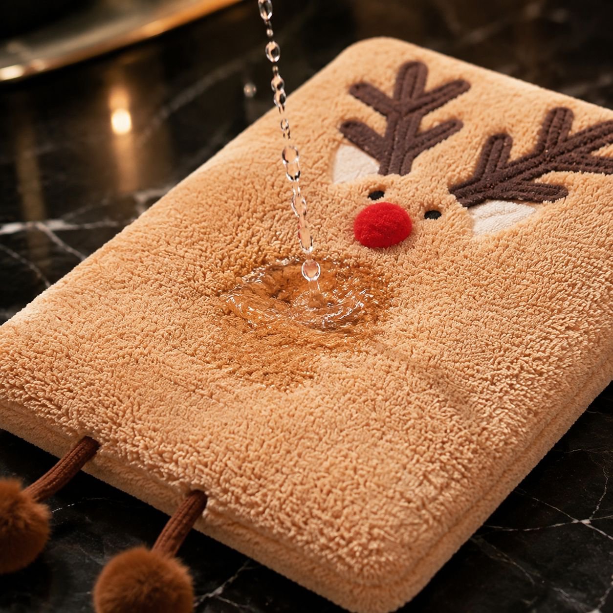 Close-up of soft coral velvet Christmas hand towel texture