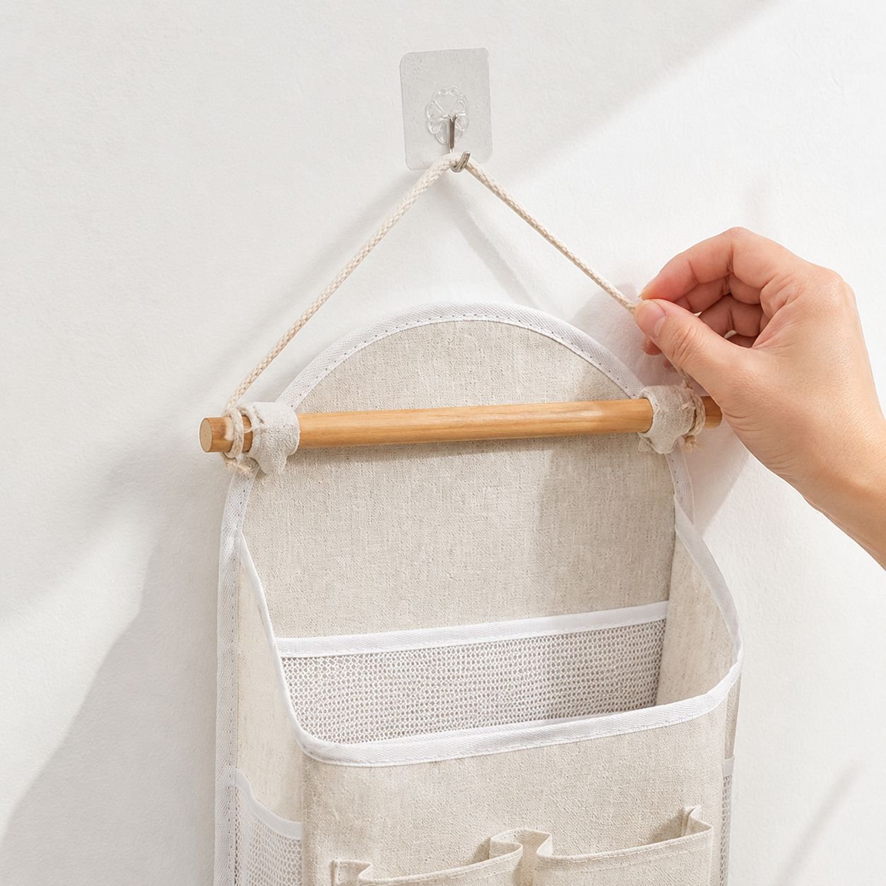 Over-the-door organizer used in a modern entryway