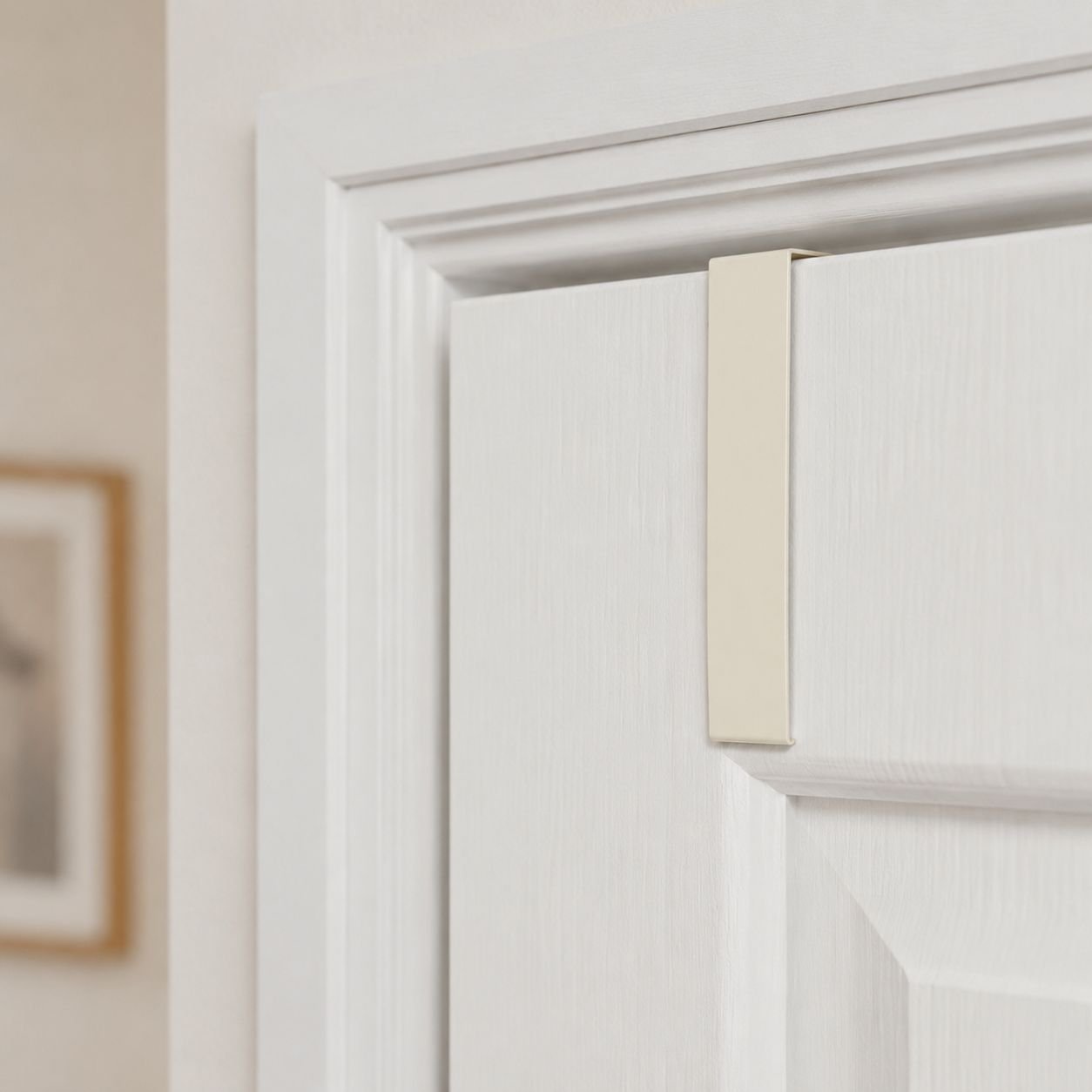 Over-the-door hook used in a bedroom for organizing accessories