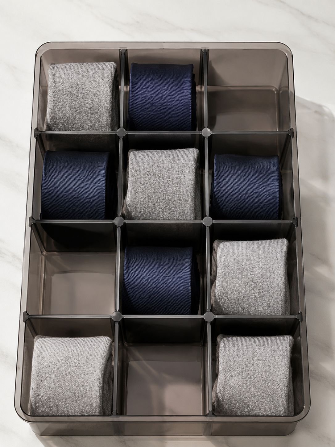 Stackable drawer boxes neatly arranged in a closet