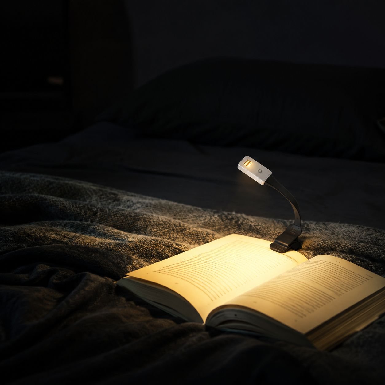 Clip-on LED lamp for bed or desk use